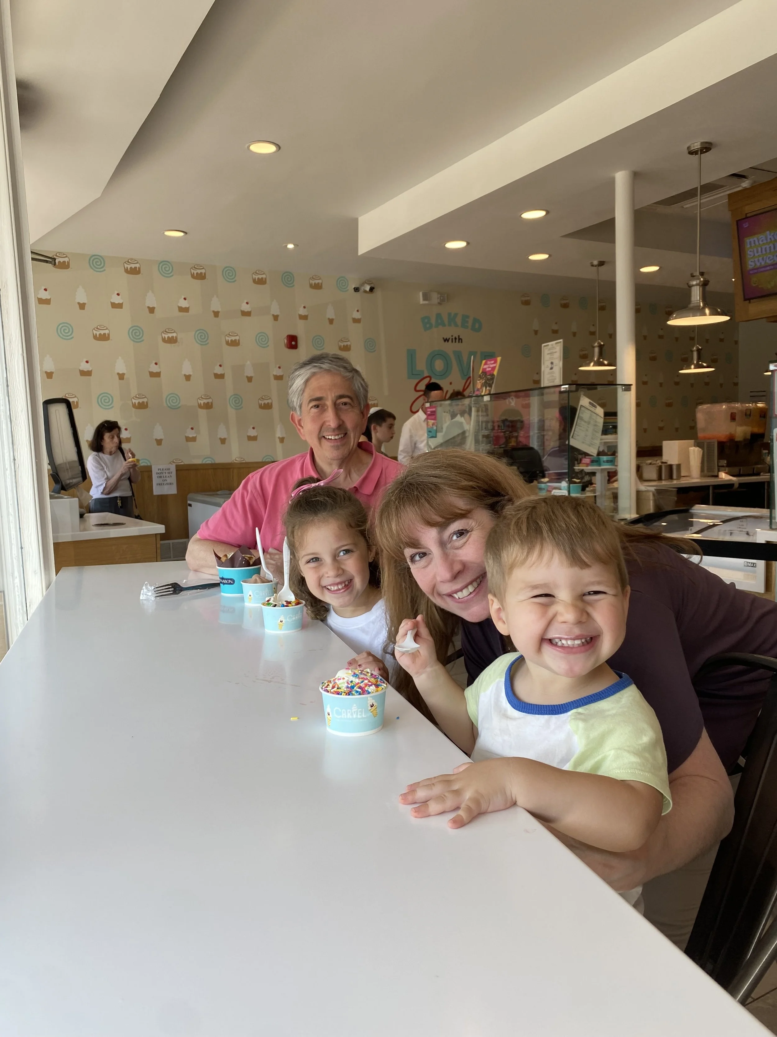 Photo of candidate Alec Stone with his family eating ice cream