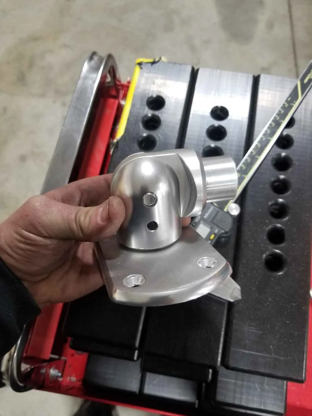 Precision machined hinged component