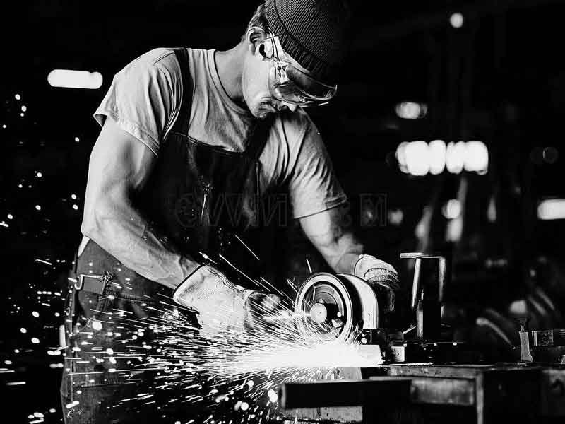 Fabricator cutting metal