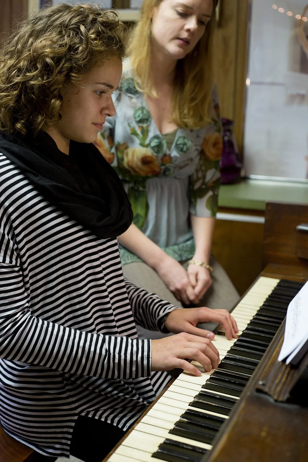 Student receiving private piano instruction at Hickory Arts in Hickory, NC, developing piano technique, creativity, and musical confidence.