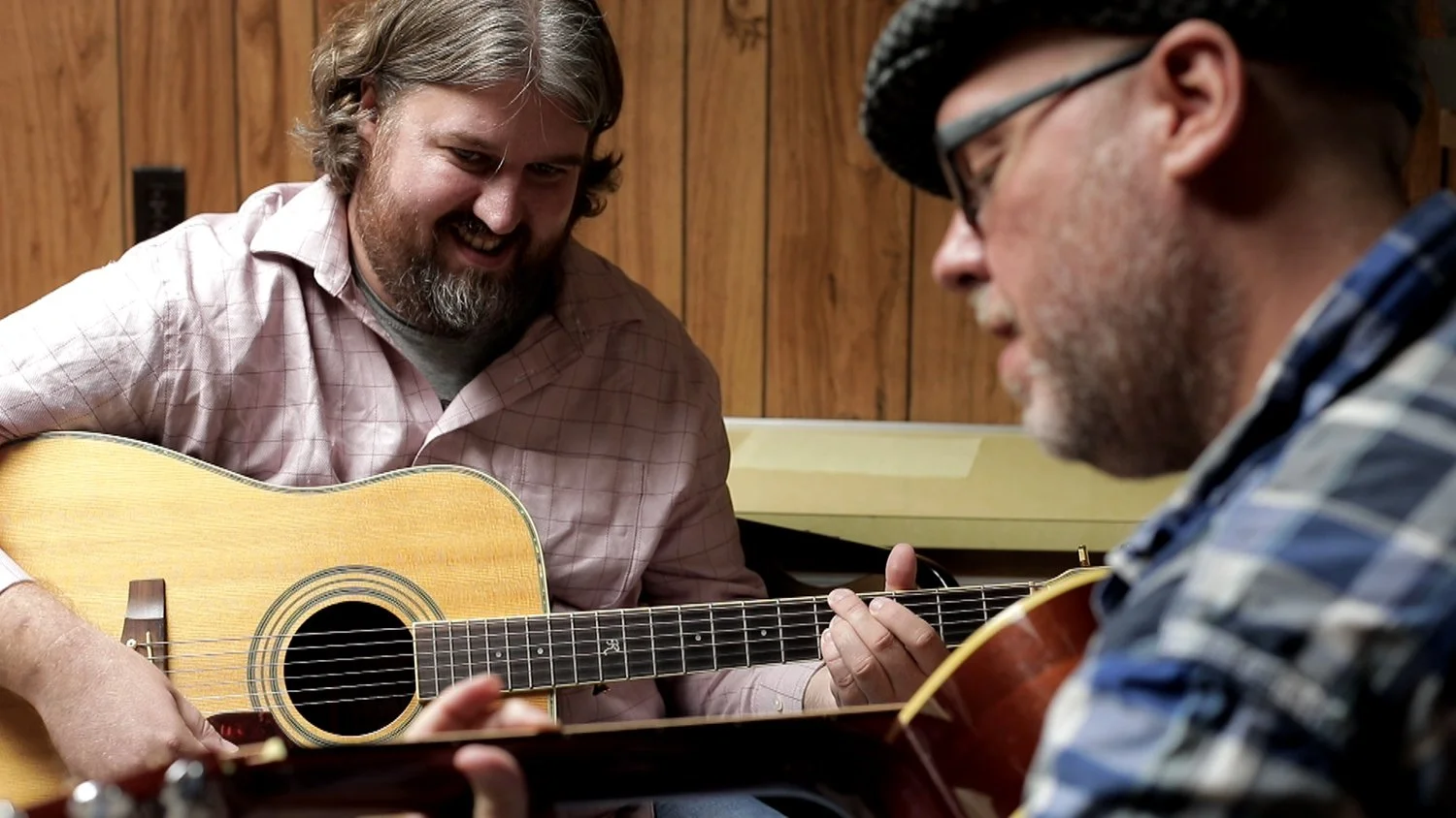Student and instructor during a private acoustic guitar lesson at Hickory Arts in Hickory, North Carolina.