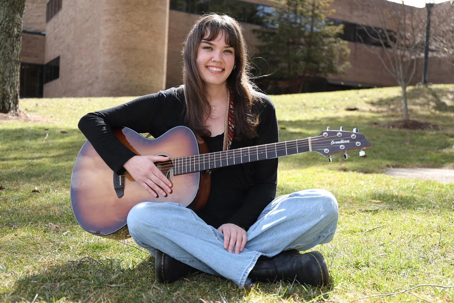 Portrait of former Hickory Arts guitar student Samantha Crabtree, who later applied her guitar training professionally in music therapy.