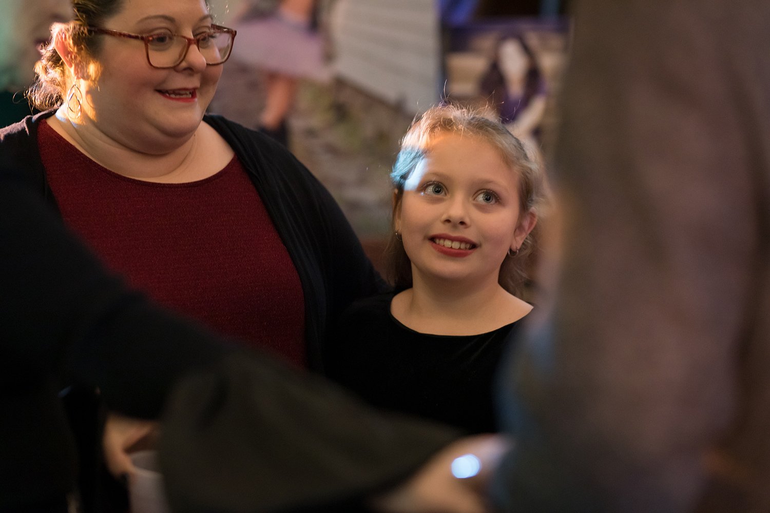 Young voice student with parent during a Hickory Arts singing and voice lesson experience in Hickory, NC.