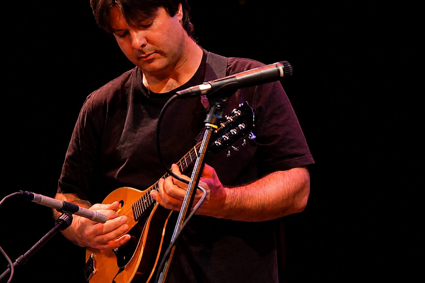 Jeremy Shaw performing on mandolin at a Hickory Arts sponsored event in Hickory, NC, representing personalized mandolin lessons, performance experience, and musicianship.