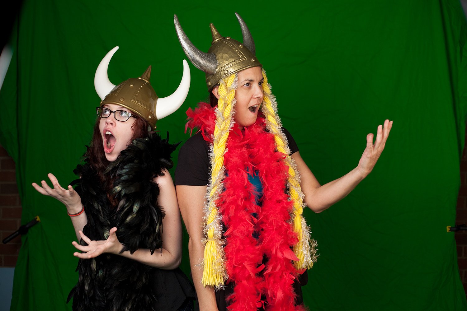 Emma Lee Kurts and student performing in costume during a creative theater and costume design session at Hickory Arts.