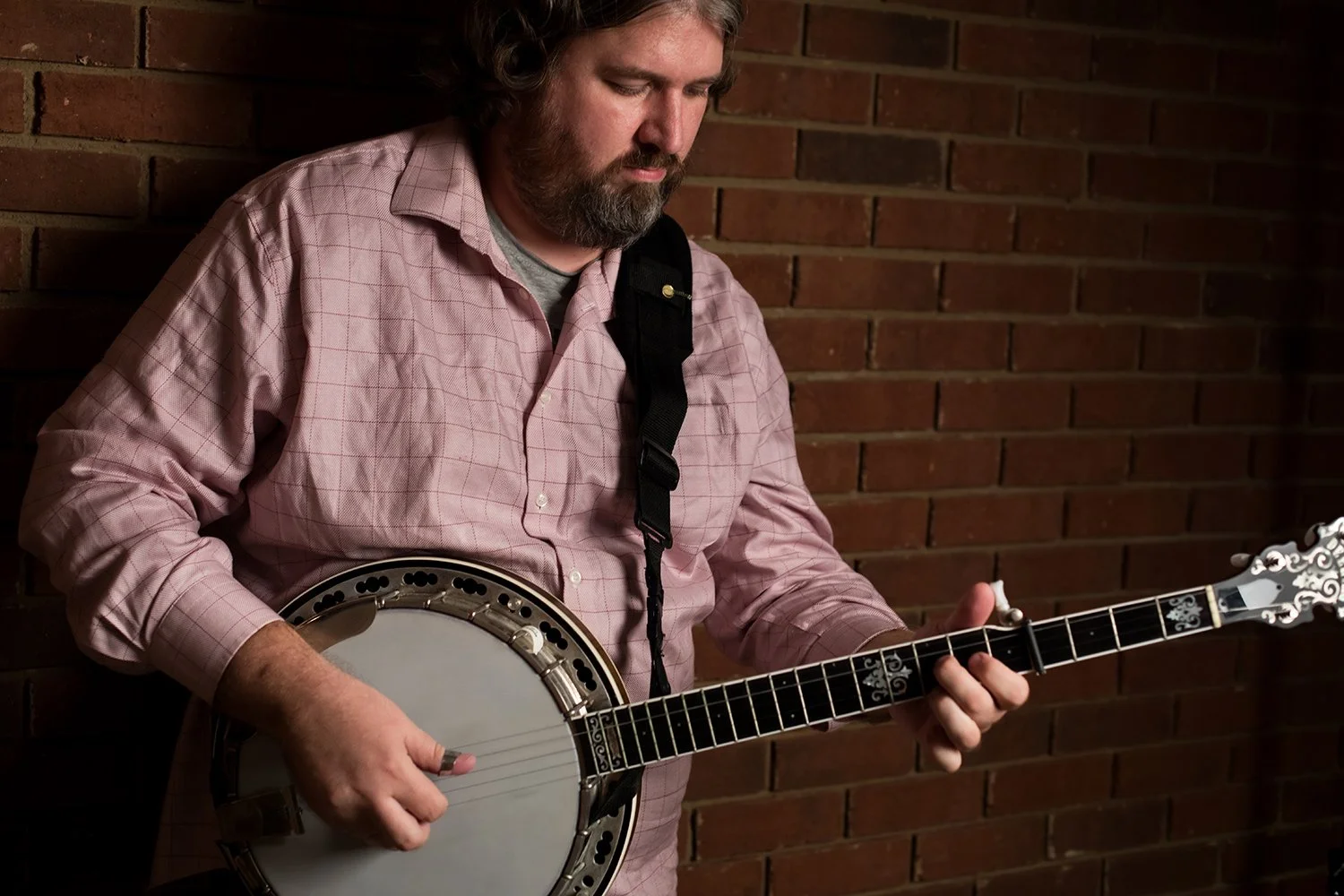 Experienced guitar instructor performing live with a band and teaching guitar lessons at Hickory Arts in Hickory, North Carolina.