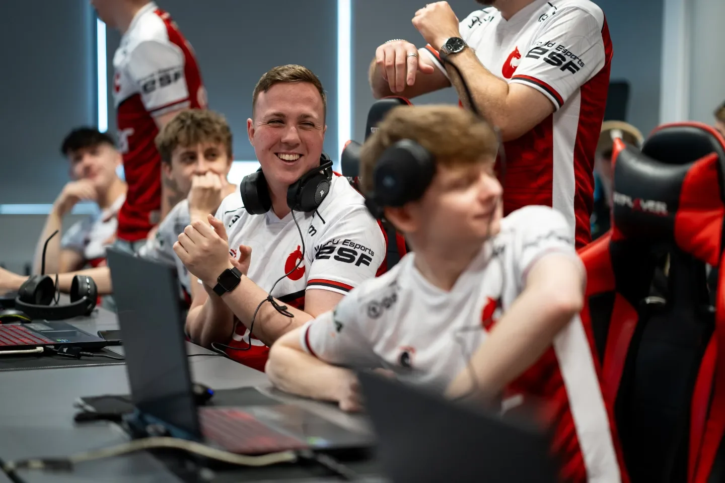 Four eSports Wales team members sat in front of laptops at the annual press conference.