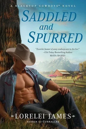 Book cover: Saddled and Spurred by Lorelei James