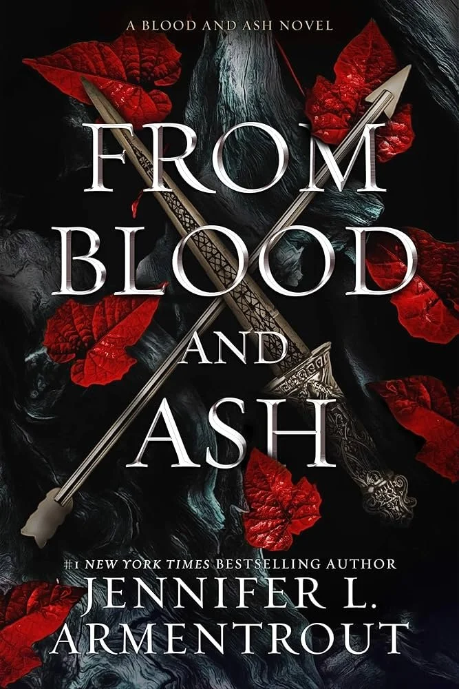 Book cover for 'From Blood and Ash' by Jennifer L. Armentrout. The cover features a dark background with swirling black and teal colors, bright red leaves, and two crossed ornate swords in the center.