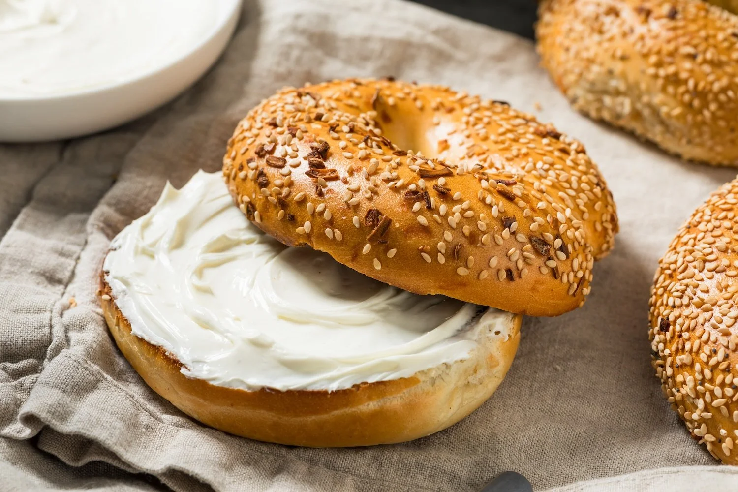 Sliced bagel with cream cheese