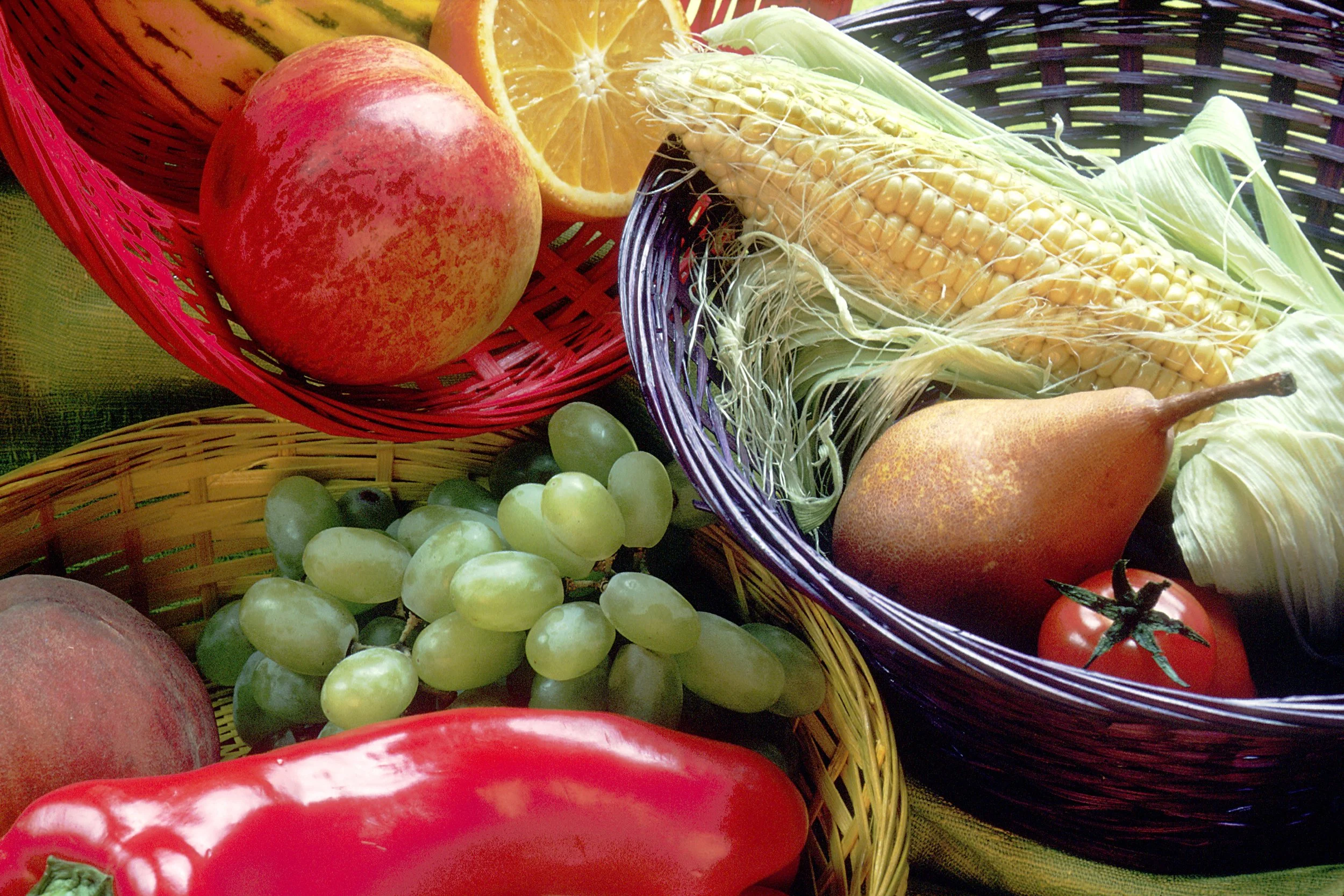Fruit and vegetable basket (corn, grapes, orange, etc.)
