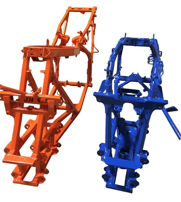 Two metal frames powder coated orange and blue.