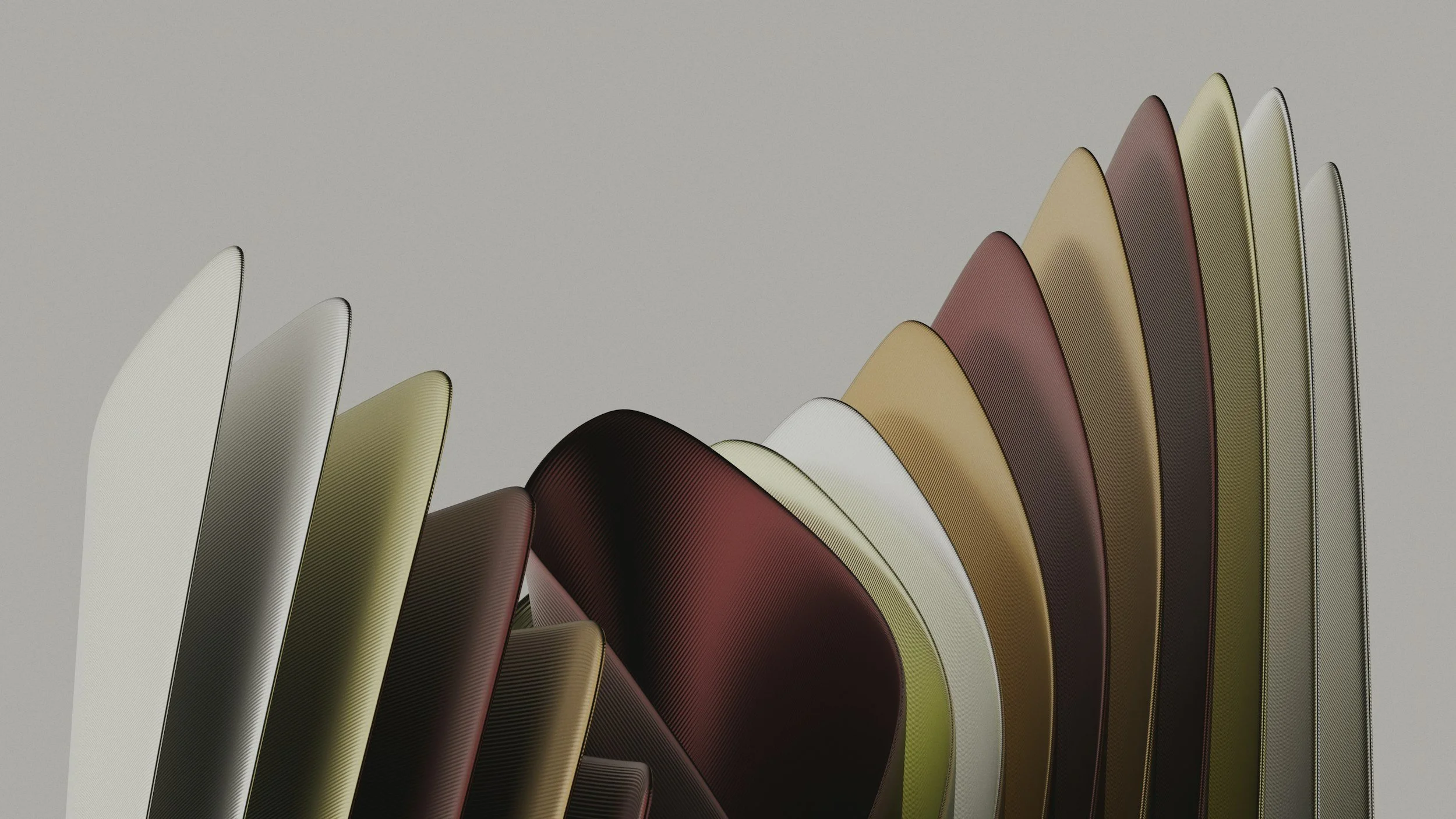 A collection of various color and textured thin curved tiles or panels is arranged in a wave-like formation against a plain light gray background.