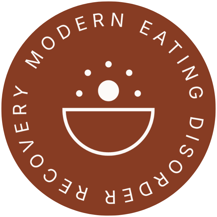 Circular logo with text that reads "Modern Eating Disorder Recovery"