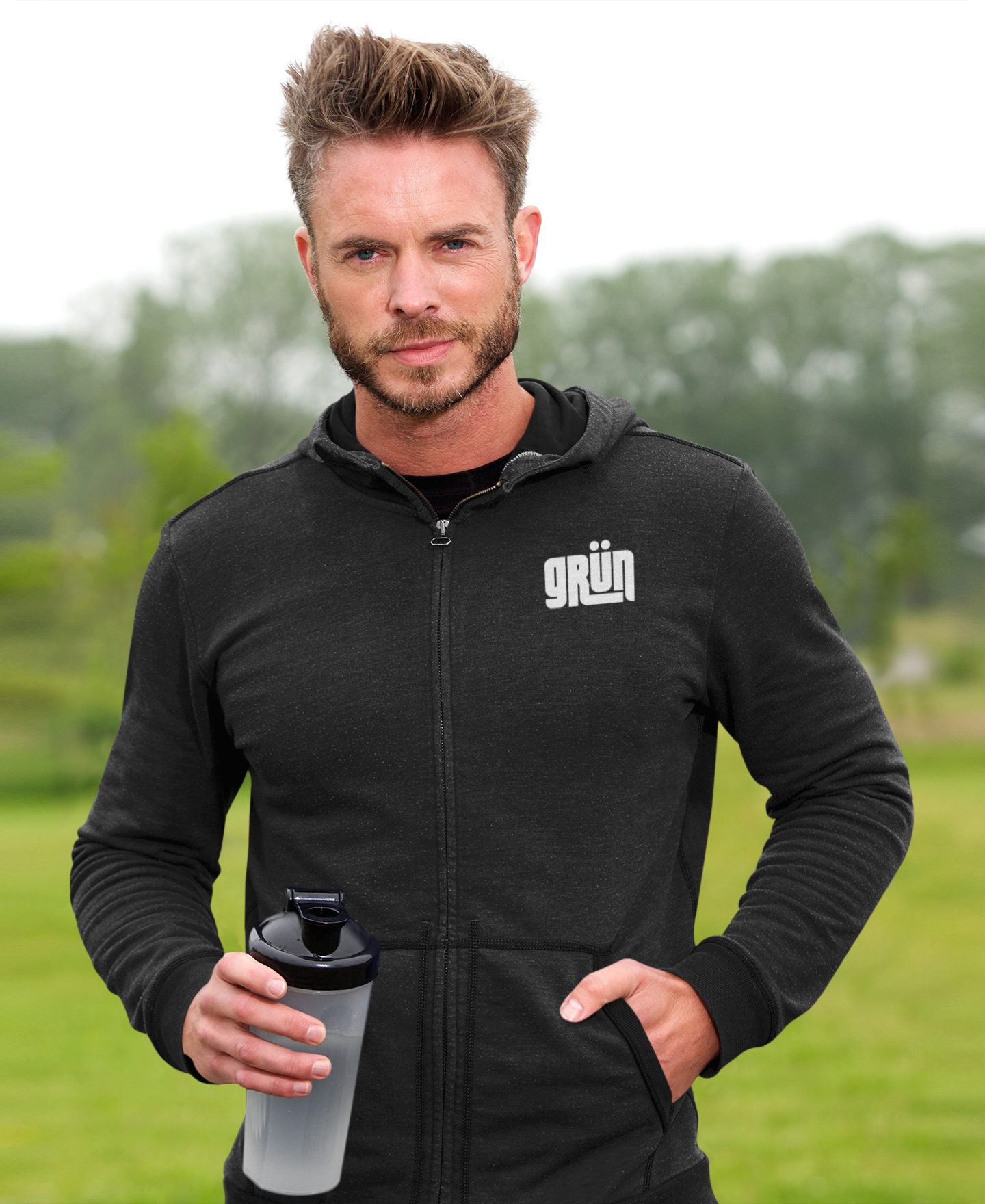 mockup-of-a-bearded-athlete-posing-with-a-hoodie-at-a-park-40185-r-el2.png