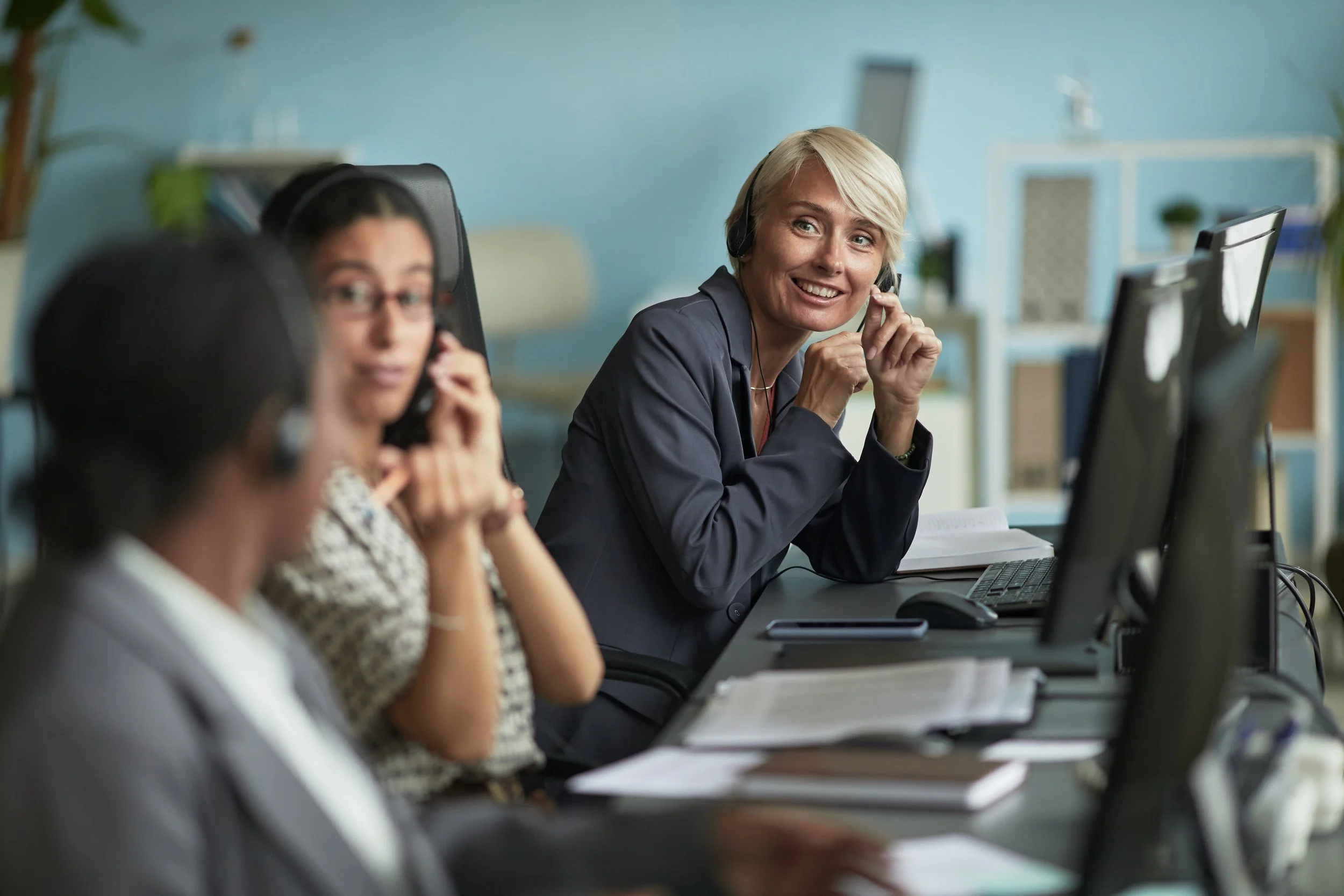 caucasian-middle-aged-woman-smiling-while-working-2026-03-20-04-19-56-utc.jpg