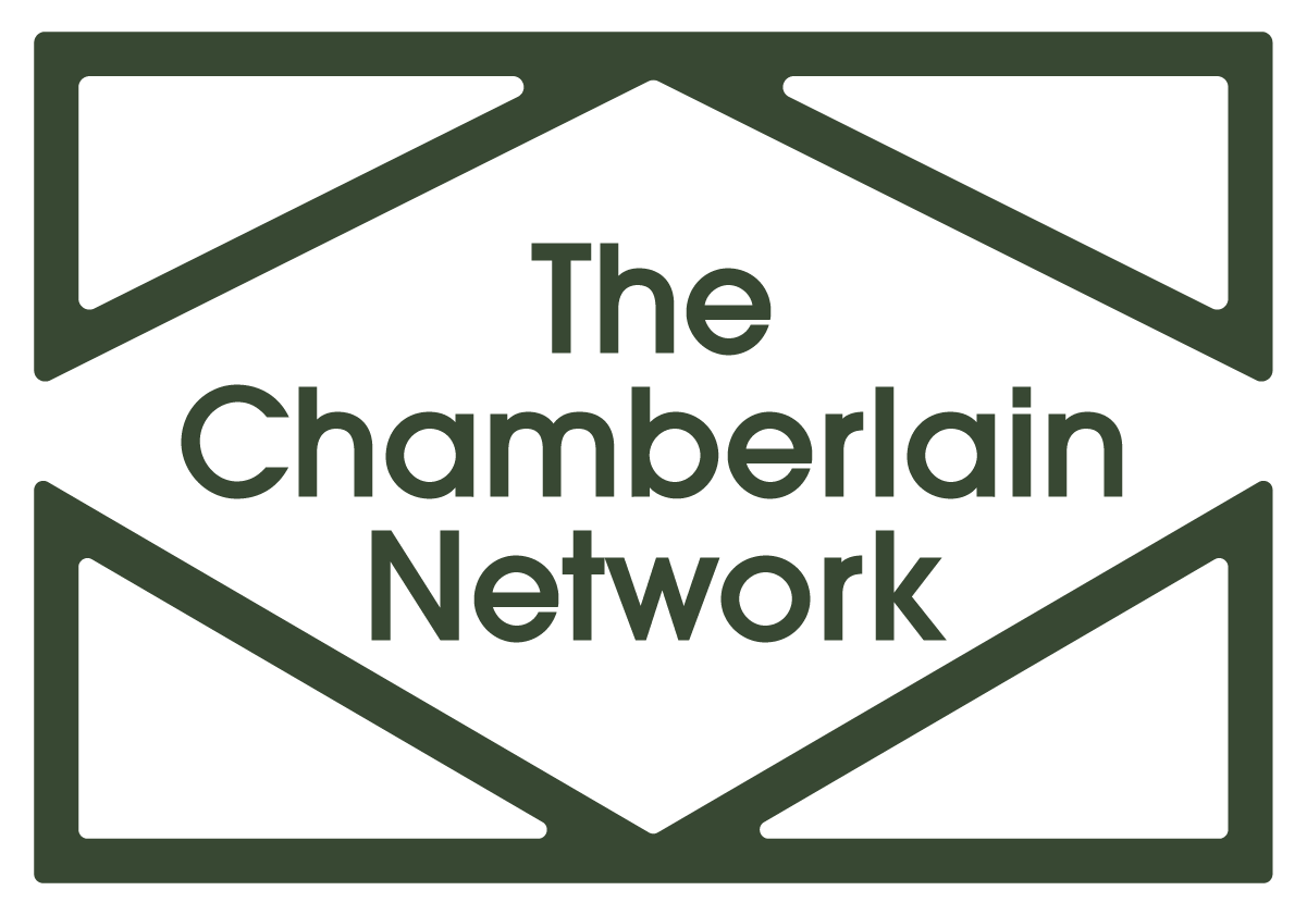 Logo with the words "The Chamberlain Network" inside a geometric frame.