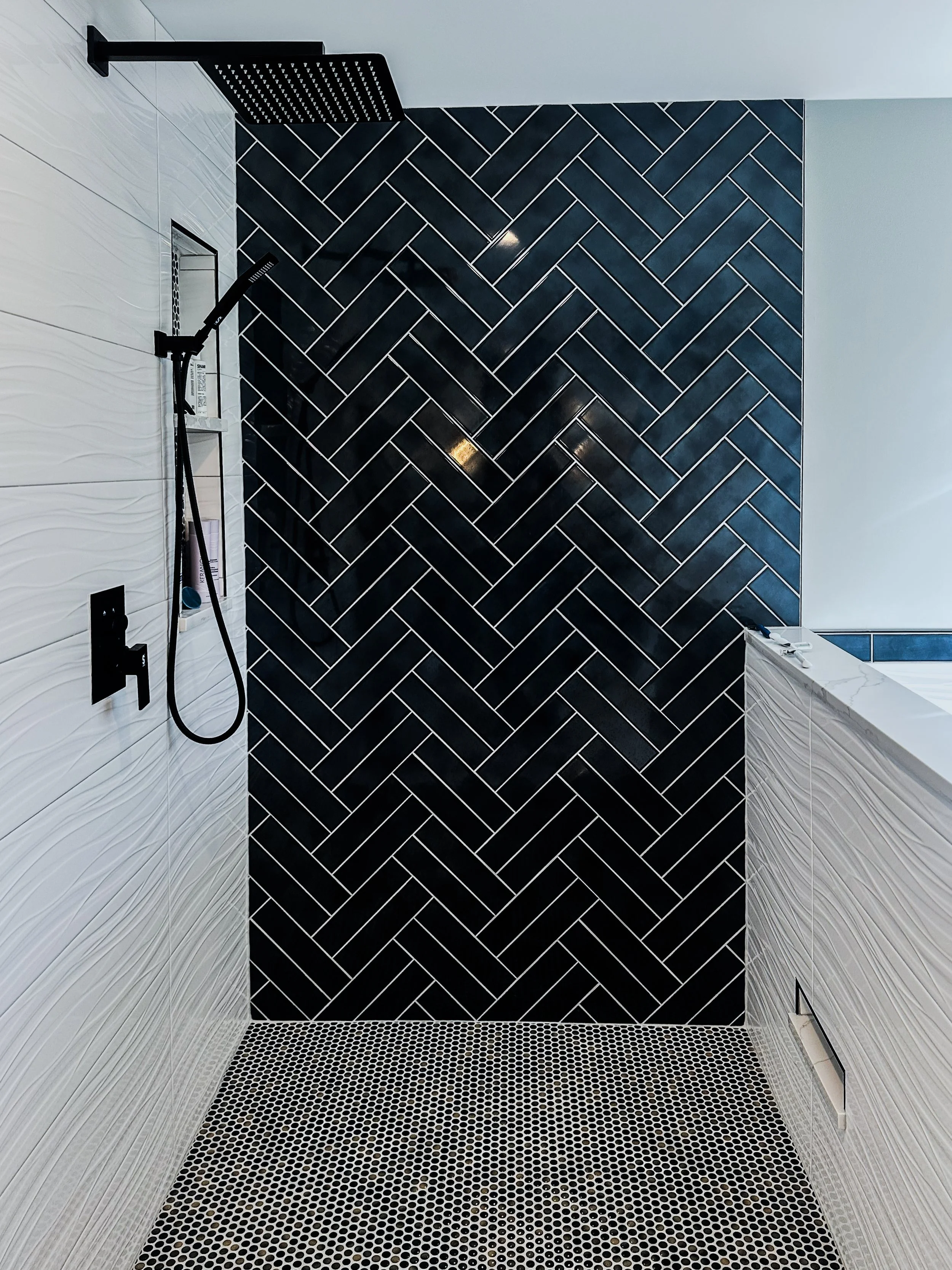 dramatic-black-herringbone-shower-tile-lake-in-the-hills-illinois.jpg.jpg