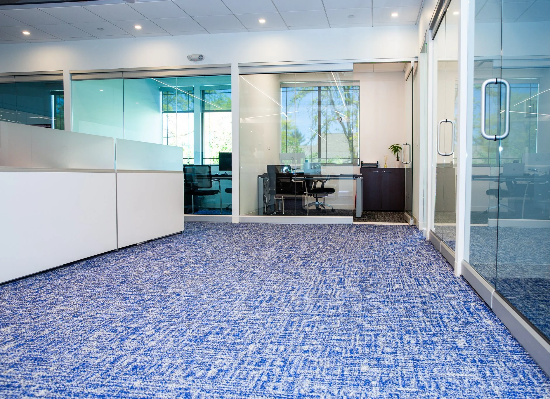 Commercial carpet tile flooring installation at TCC Wireless retail store in Bloomingdale IL