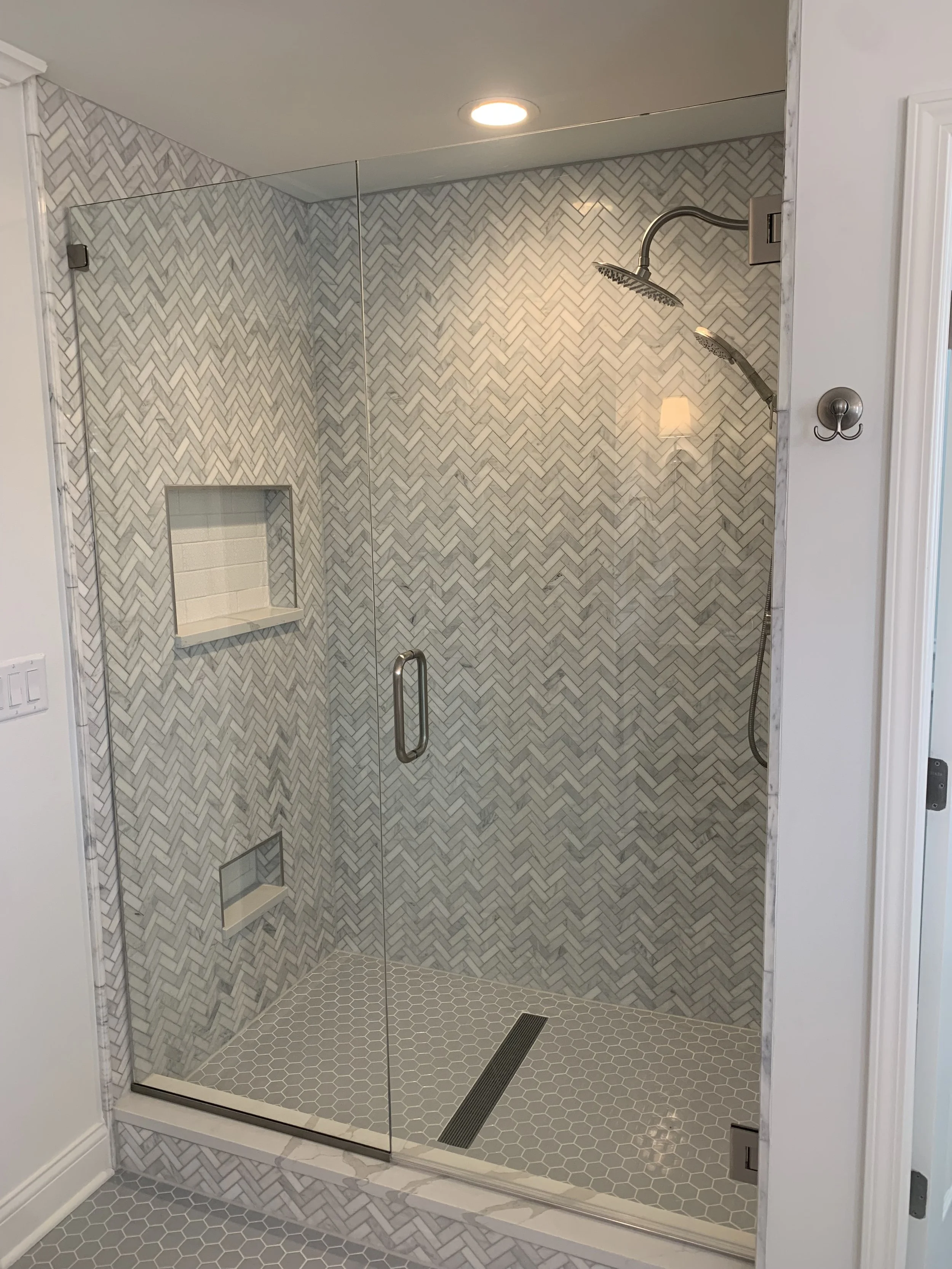 custom-marble-herringbone-shower-pebble-floor-huntley-il.jpg.jpg