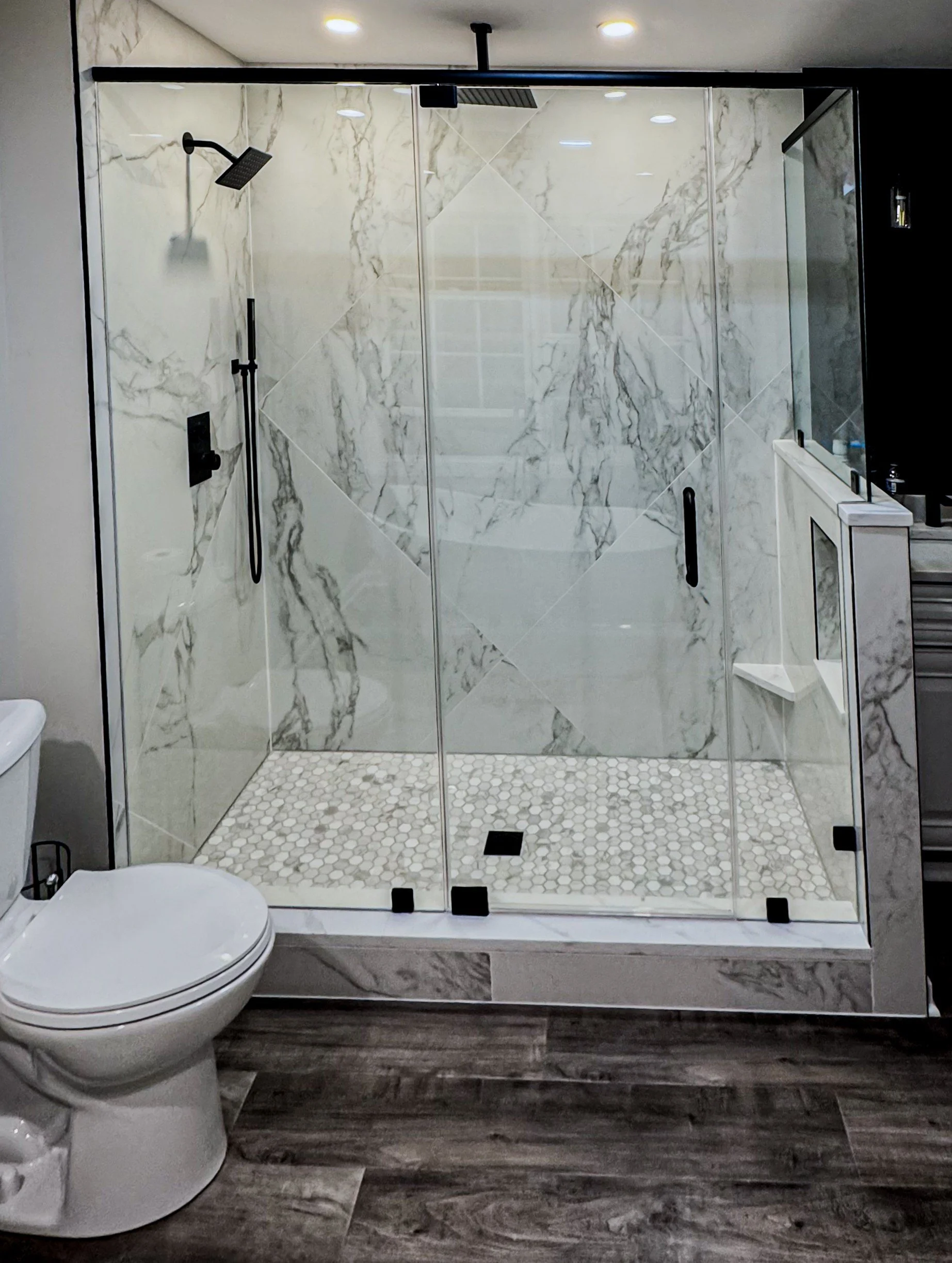 Custom shower 4x4 porcelain tile 45 degree diagonal pattern white hex pan wood floor Lakewood IL
