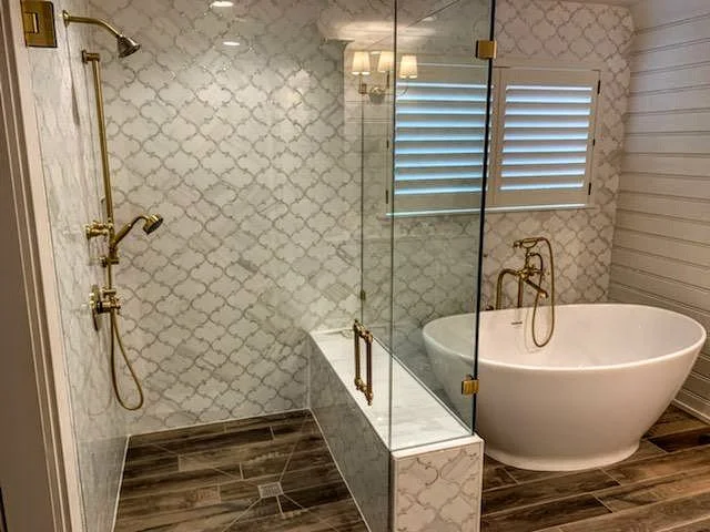 Custom shower tile installations by Artisan Tile Creations serving Crystal Lake IL and the northwest Chicago suburbs. Featuring marble, porcelain, travertine, mosaic, and natural stone tile in herringbone, arabesque, diagonal, and subway patterns. Sp