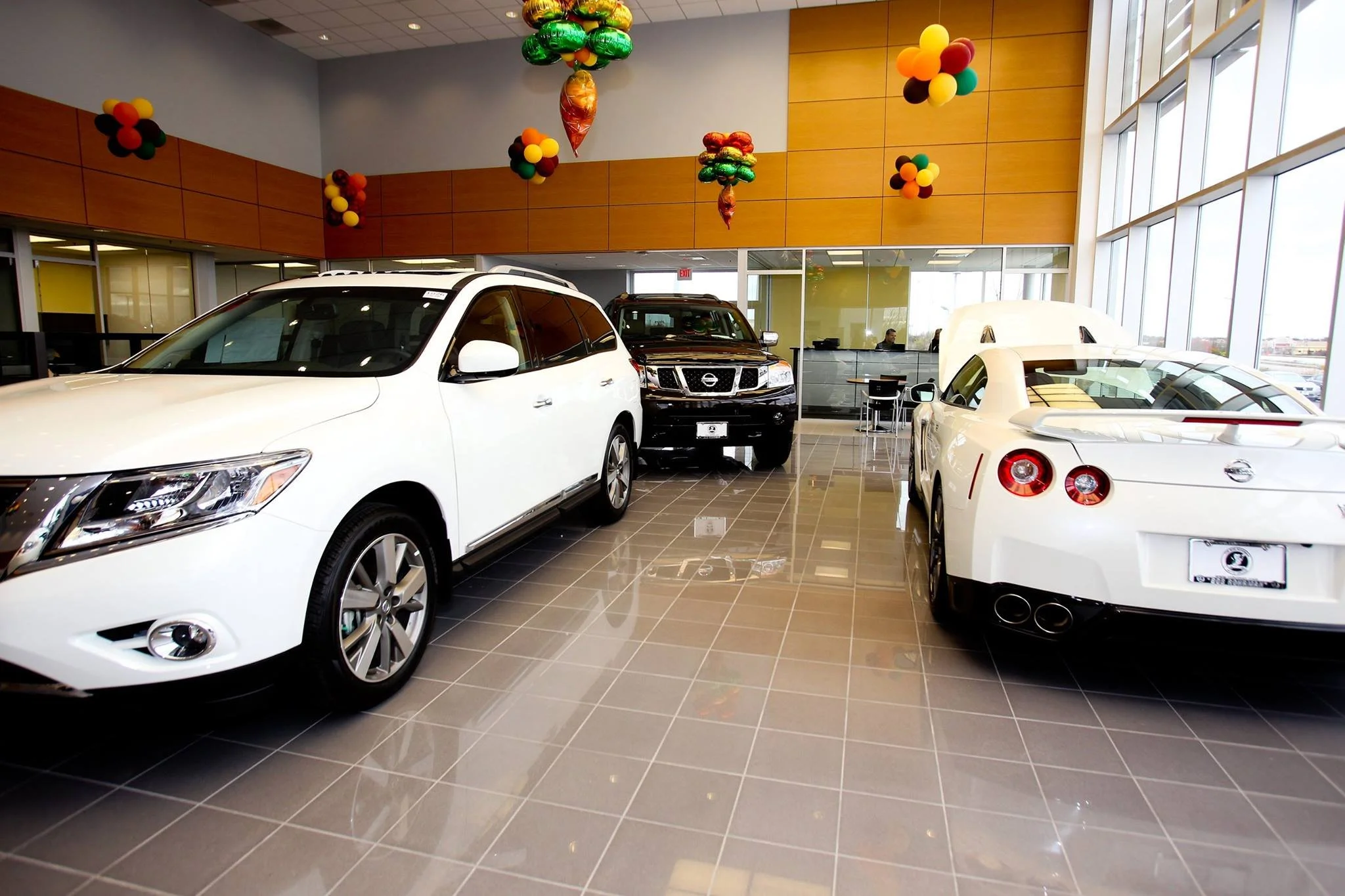 Commercial tile and flooring installations by Artisan Tile Creations serving Crystal Lake IL and the northwest Chicago suburbs. Featuring porcelain tile, natural stone, carpet tile, epoxy flooring, and luxury vinyl for auto dealerships, restaurants, 