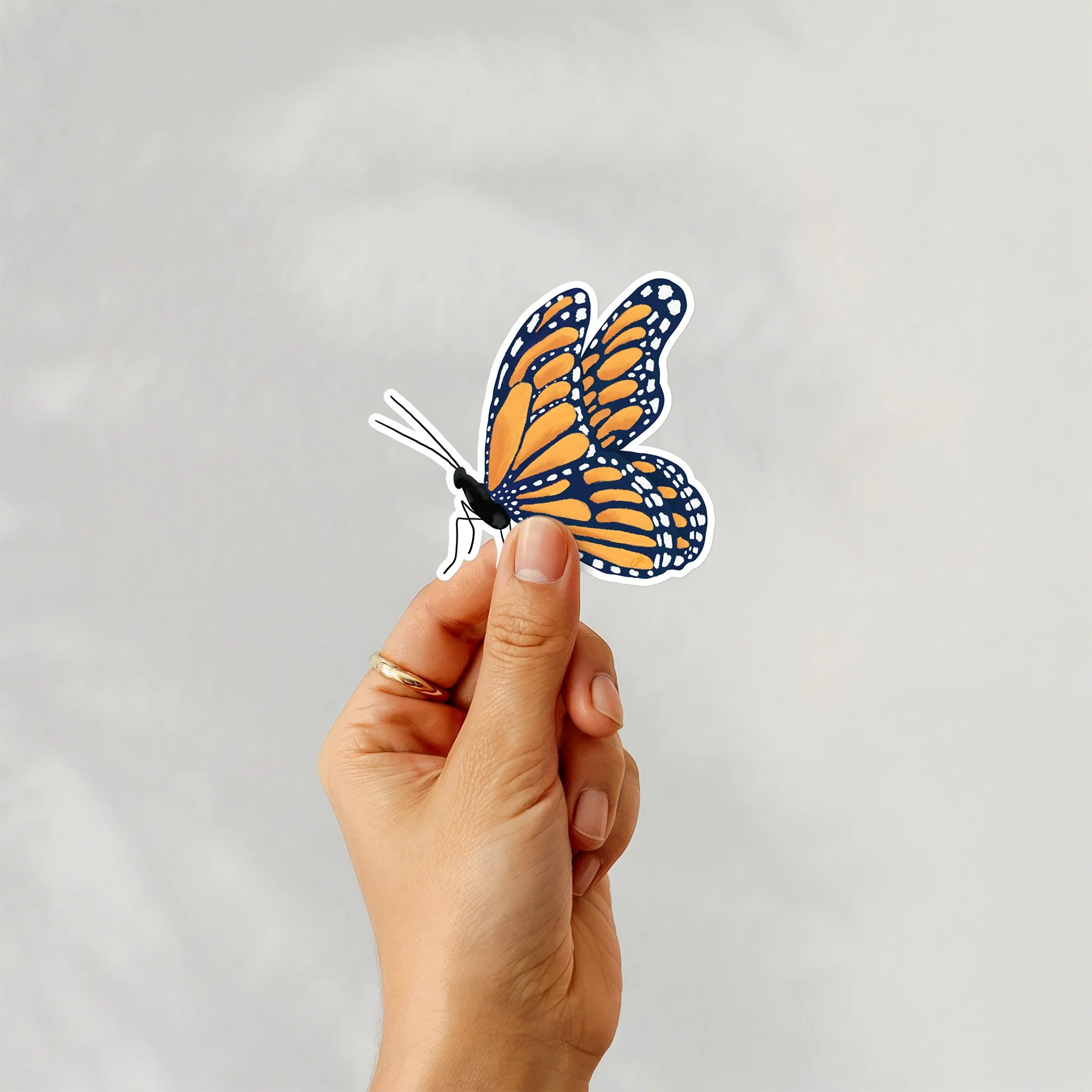 Butterfly-Navy-3inch-Sticker-Mockup.jpg