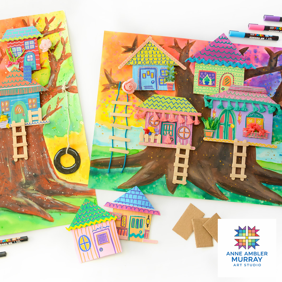 Colorful diorama art projects of houses on trees, with painted backgrounds and miniature ladders, markers, and paper pieces used for decoration.