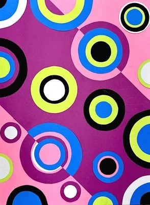Colorful concentric circles on a pink and purple background.