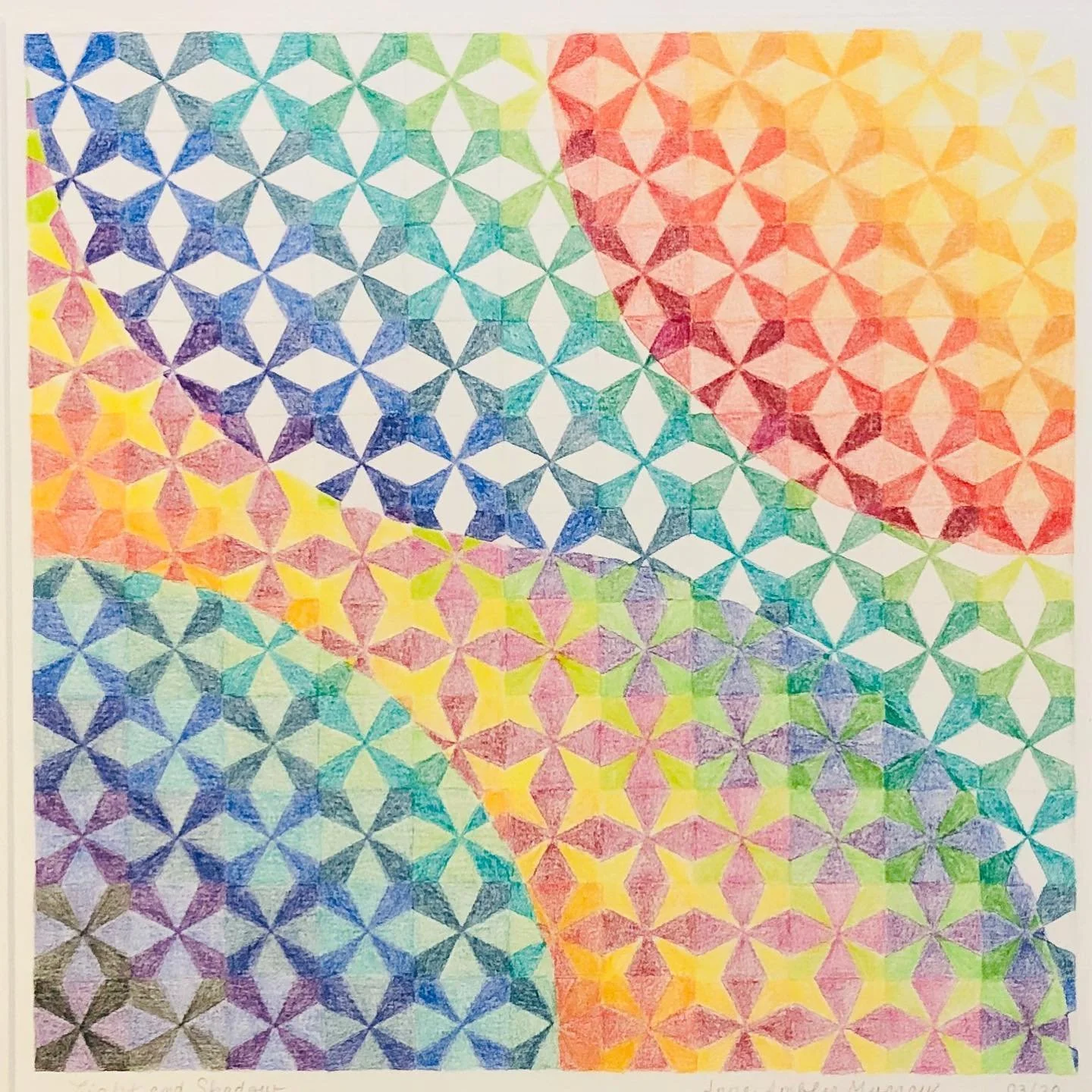 Colorful geometric pattern with overlapping diamond shapes in shades of blue, green, yellow, orange, red, and purple.