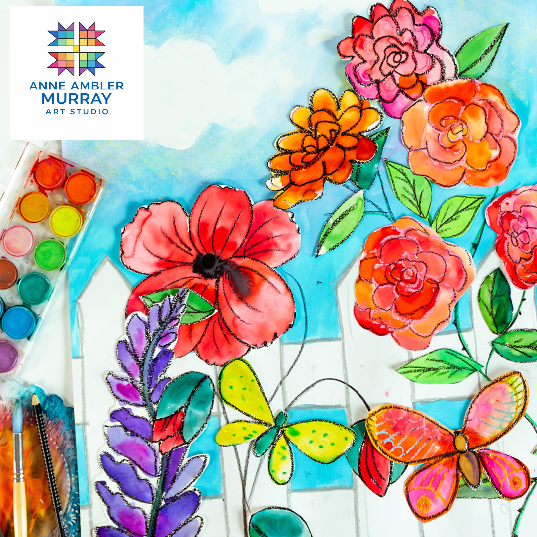 Colorful watercolor painting of various flowers, including roses, a poppy, a lavender plant, a butterfly, and a butterfly-shaped ornament, with watercolor paints and brushes nearby.