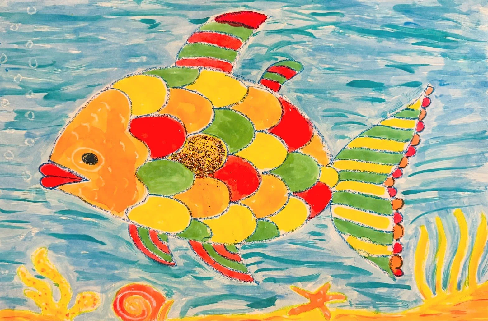 Colorful, artistic drawing of a fish with a body made of overlapping semi-circular shapes in red, orange, yellow, and green, swimming in a blue aquatic scene with yellow and orange coral and seaweed at the bottom.