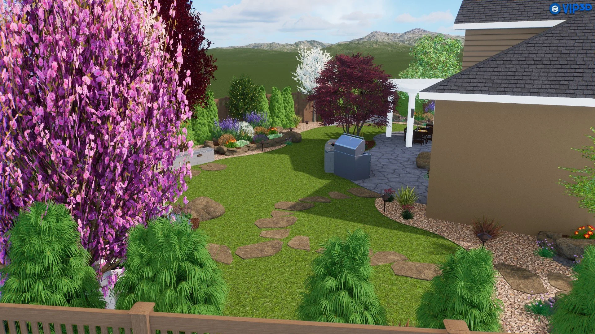 A colorful and well-maintained backyard garden with a stone pathway, vibrant pink, red, white, and purple flowering trees and shrubs, a barbecue grill, a patio area with seating, and a backdrop of green rolling hills and mountains under a partly clou