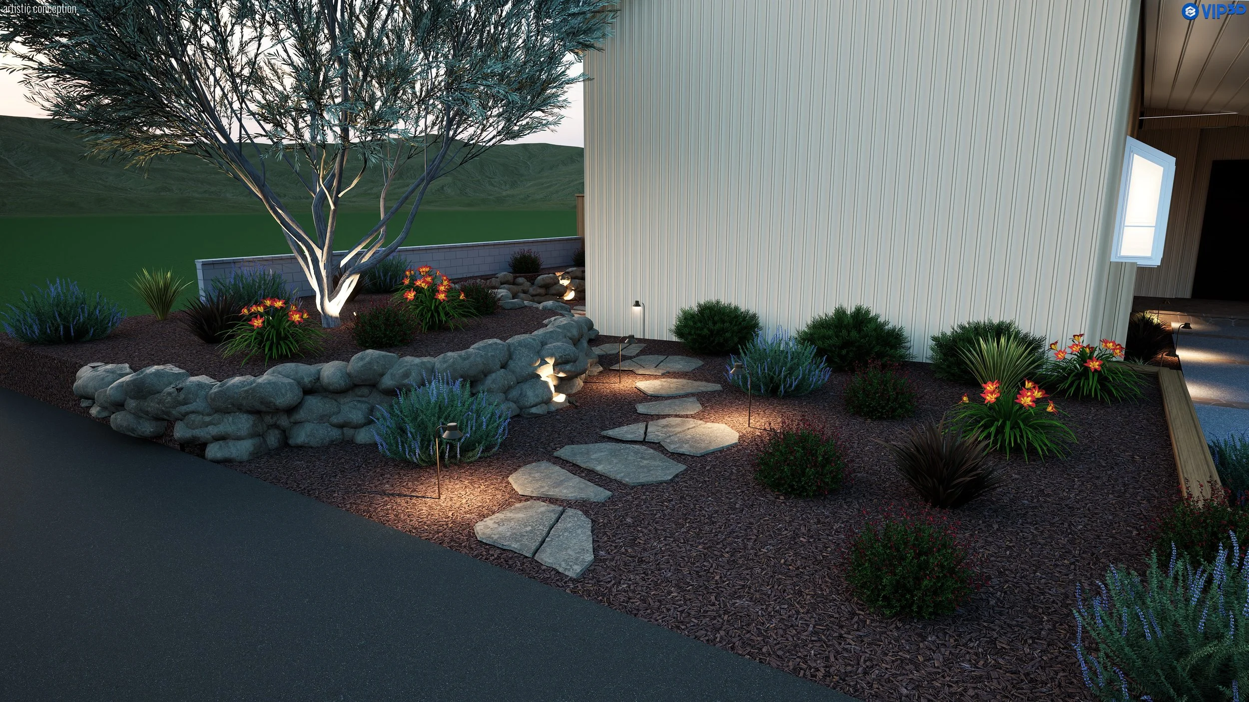A landscaped garden with a large tree illuminated from below, surrounded by flowering plants, rocks, and a stone pathway near a modern building with vertical siding and open window.