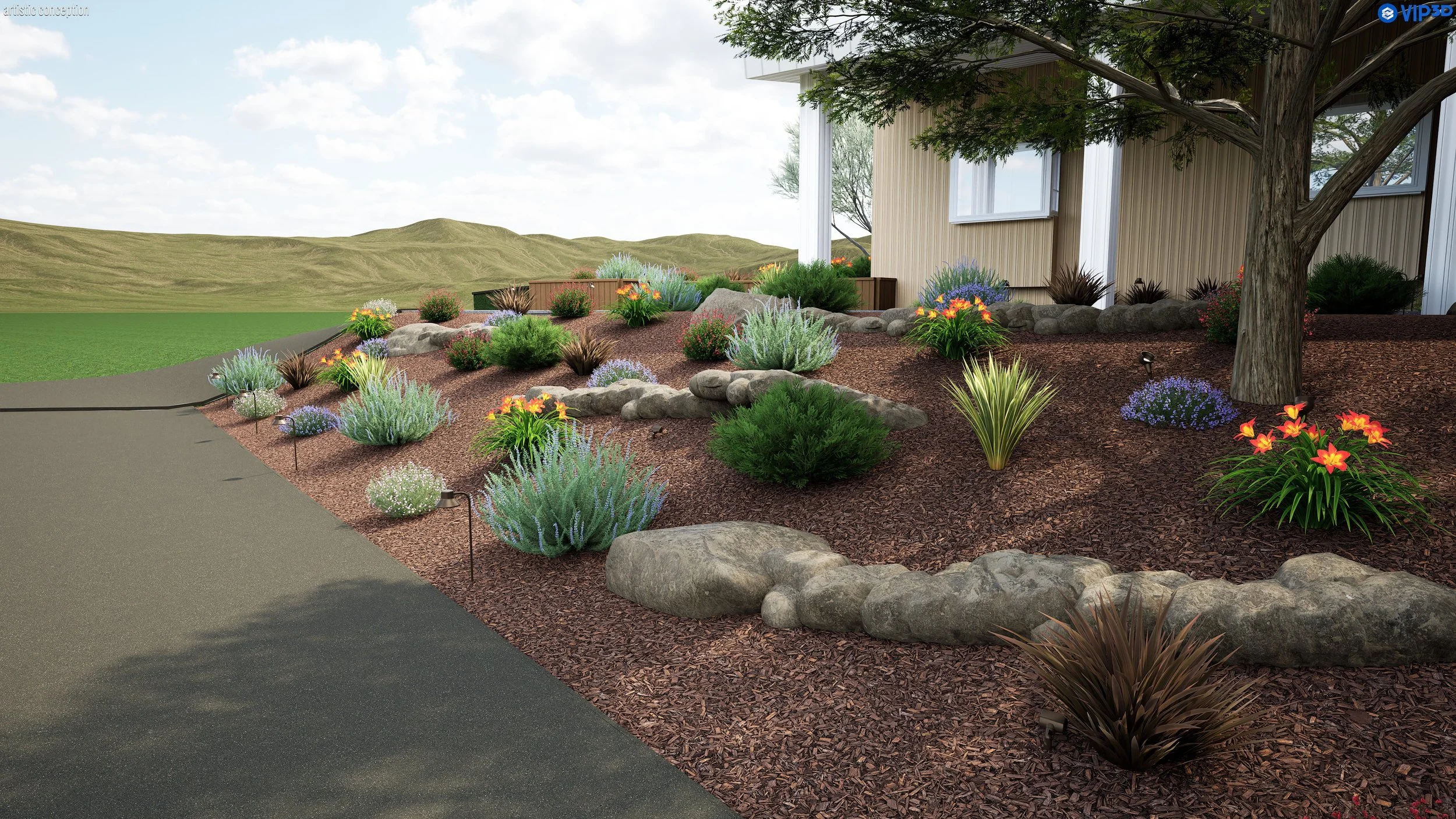 A landscaped front yard with a variety of flowering plants, shrubs, and rocks, adjacent to a house with beige siding and white trim, set against rolling green hills and a partly cloudy sky.