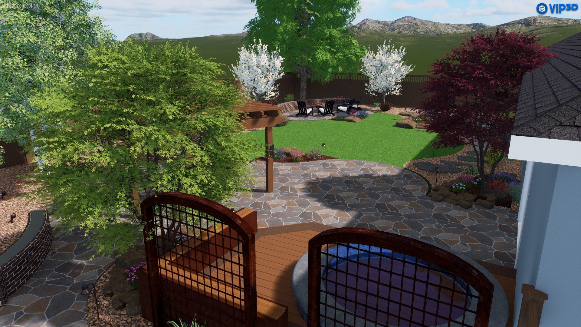 A landscaped backyard with a stone patio, lush green lawn, various trees including a maple with green leaves, white and purple flowering trees, and mountains in the background, featuring outdoor seating and decorative plants.