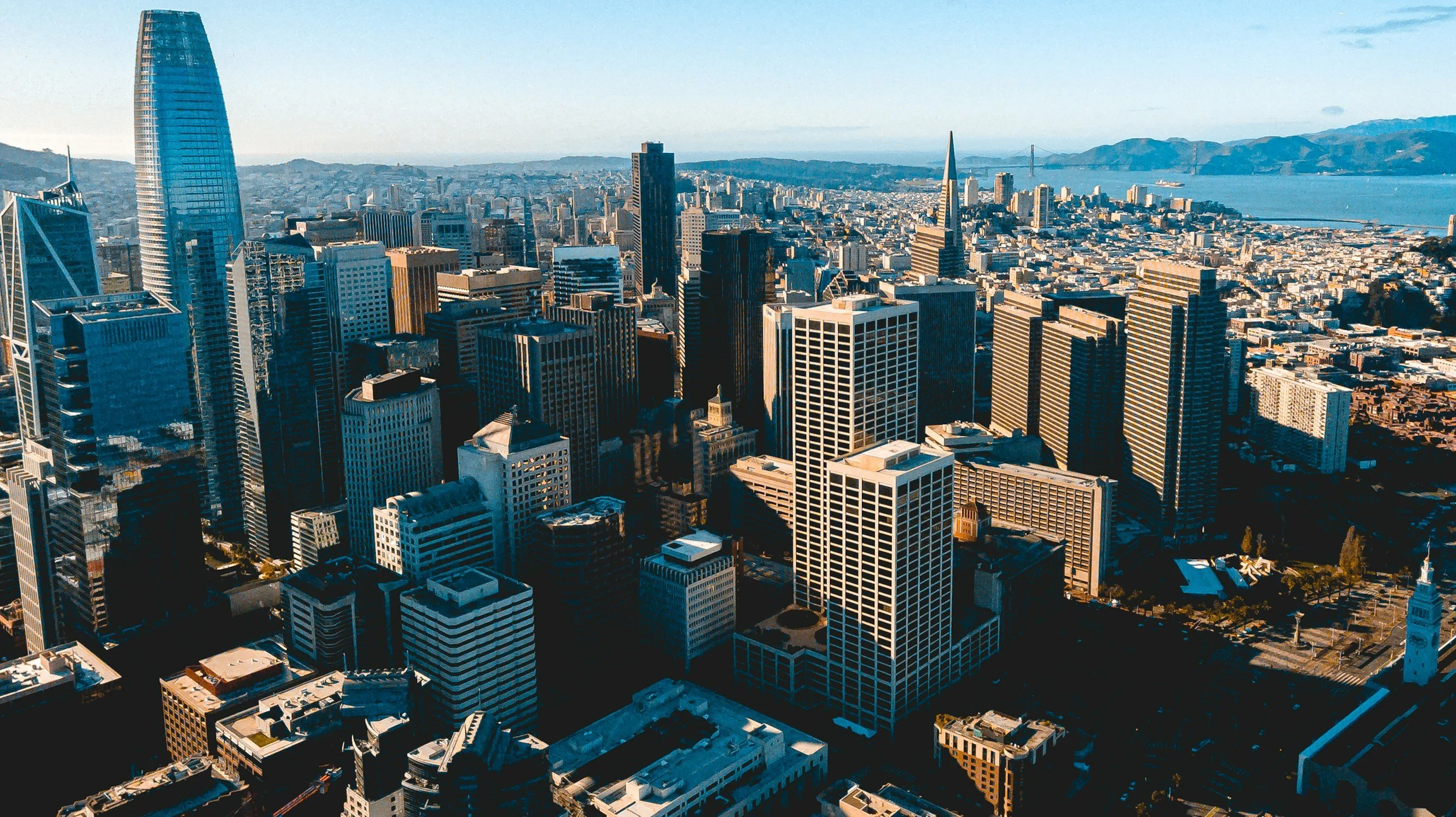 Aerial view of San Francisco skyline with tall skyscrapers, where Clarify's headquarters are located