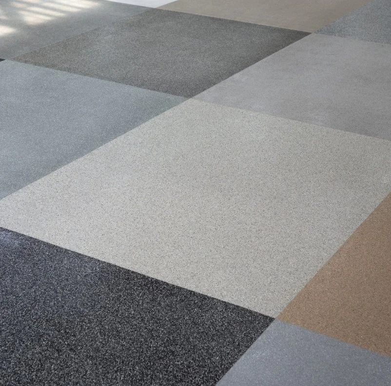 display of different kinds of flake flooring in leggari warehouse
