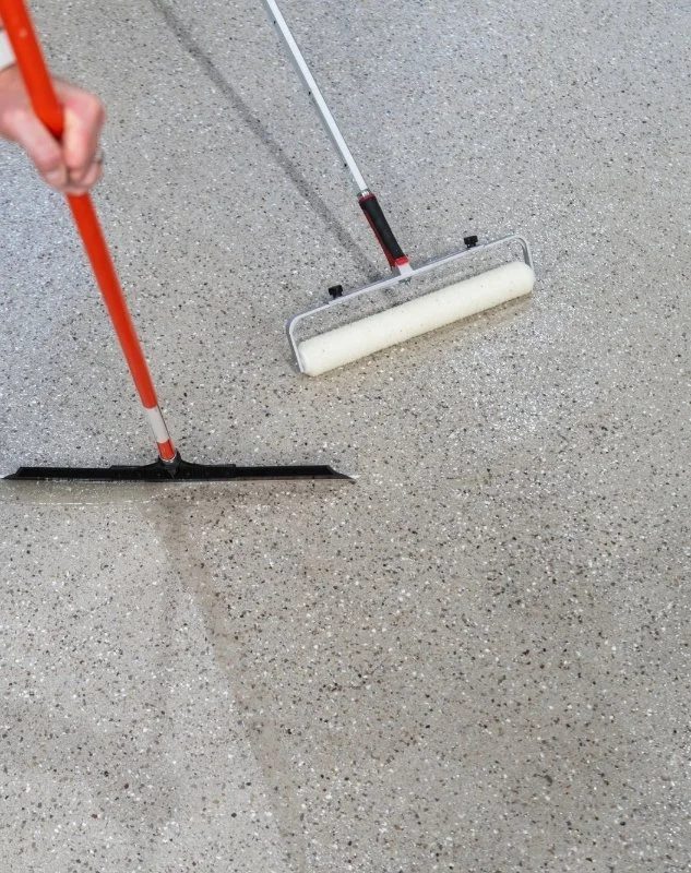 exodus epoxy and flooring using squee gee and roller