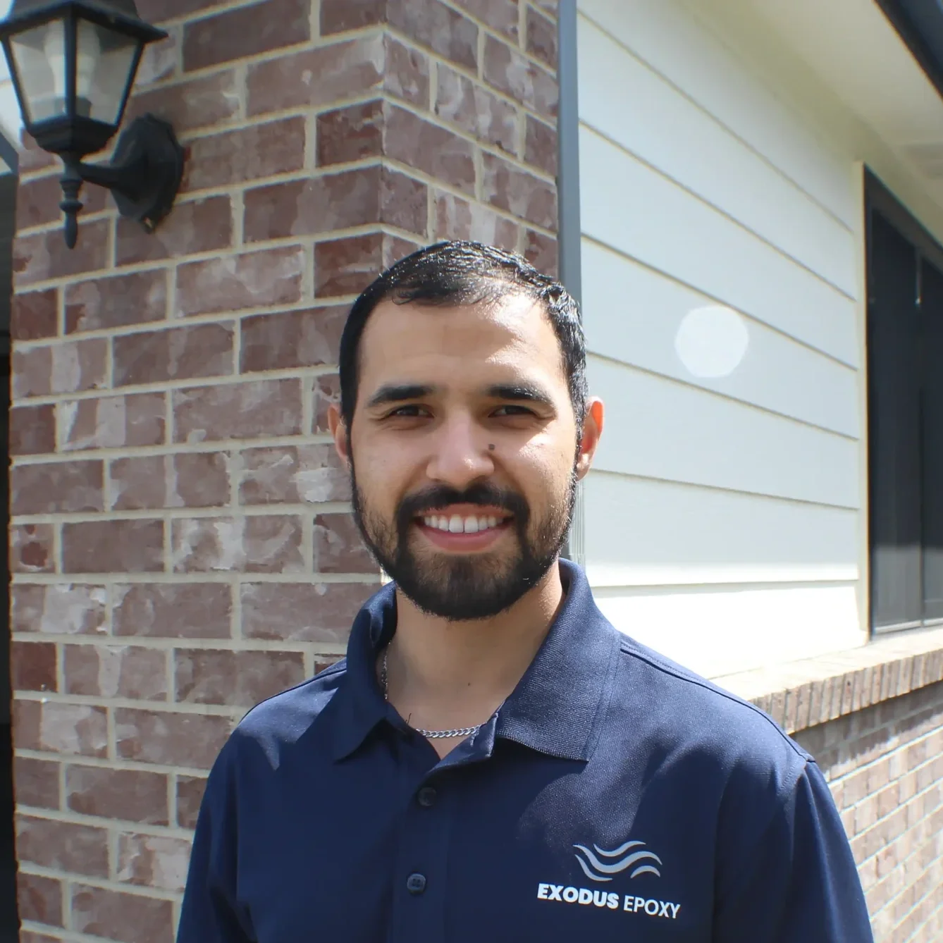 daniel medina 1/3 owner of exodus epoxy and flooring