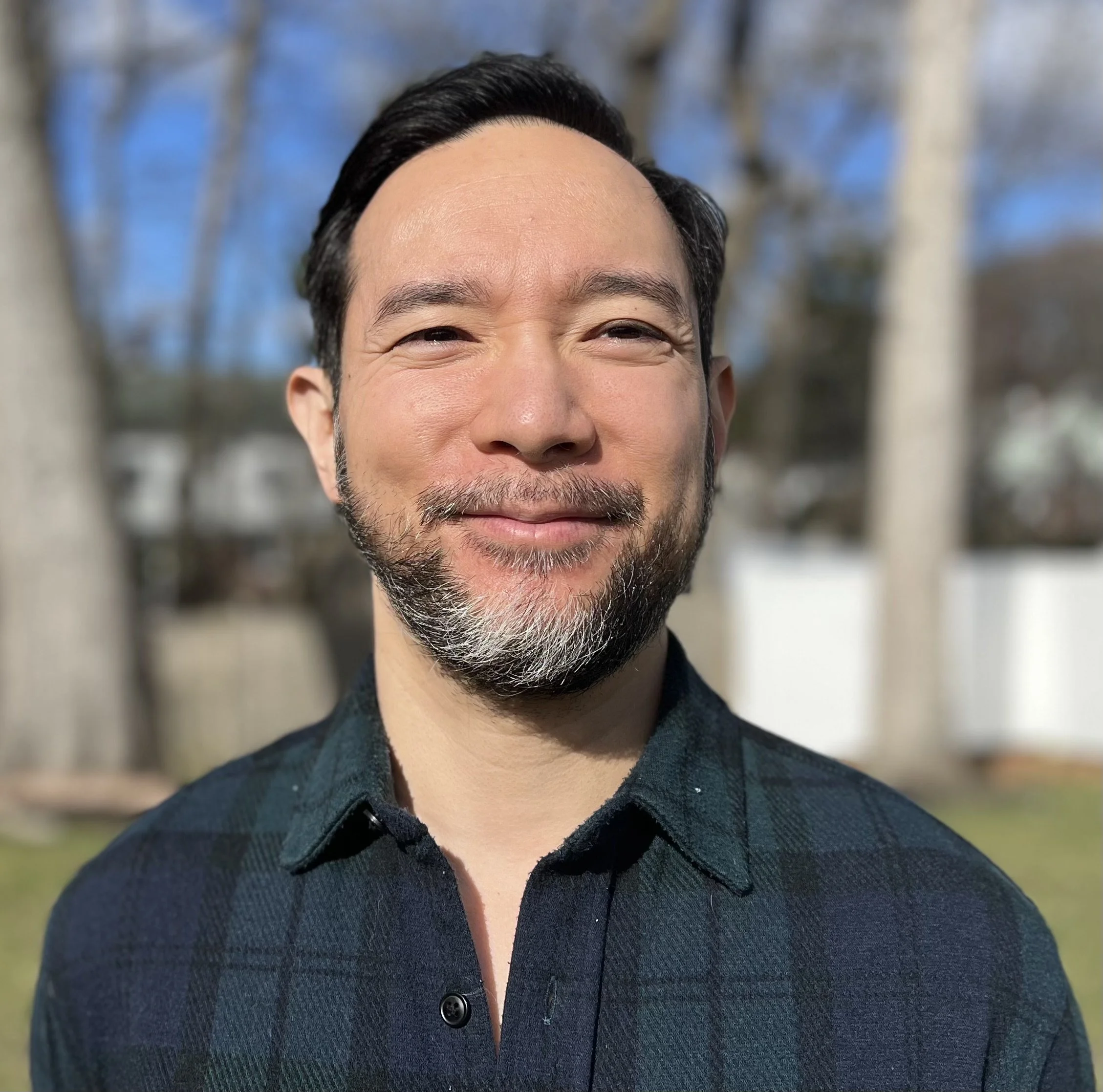 Headshot of Shinichi Daimyo, psychiatric nurse practitioner and therapist serving Greater Boston, specializing in PTSD, anxiety, depression, and ADHD