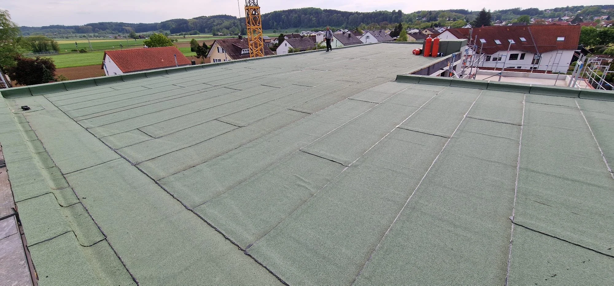 Газопламъчно поставяне на многопластова битумна хидроизолация като подизпълнител, Stuttgart, Германия