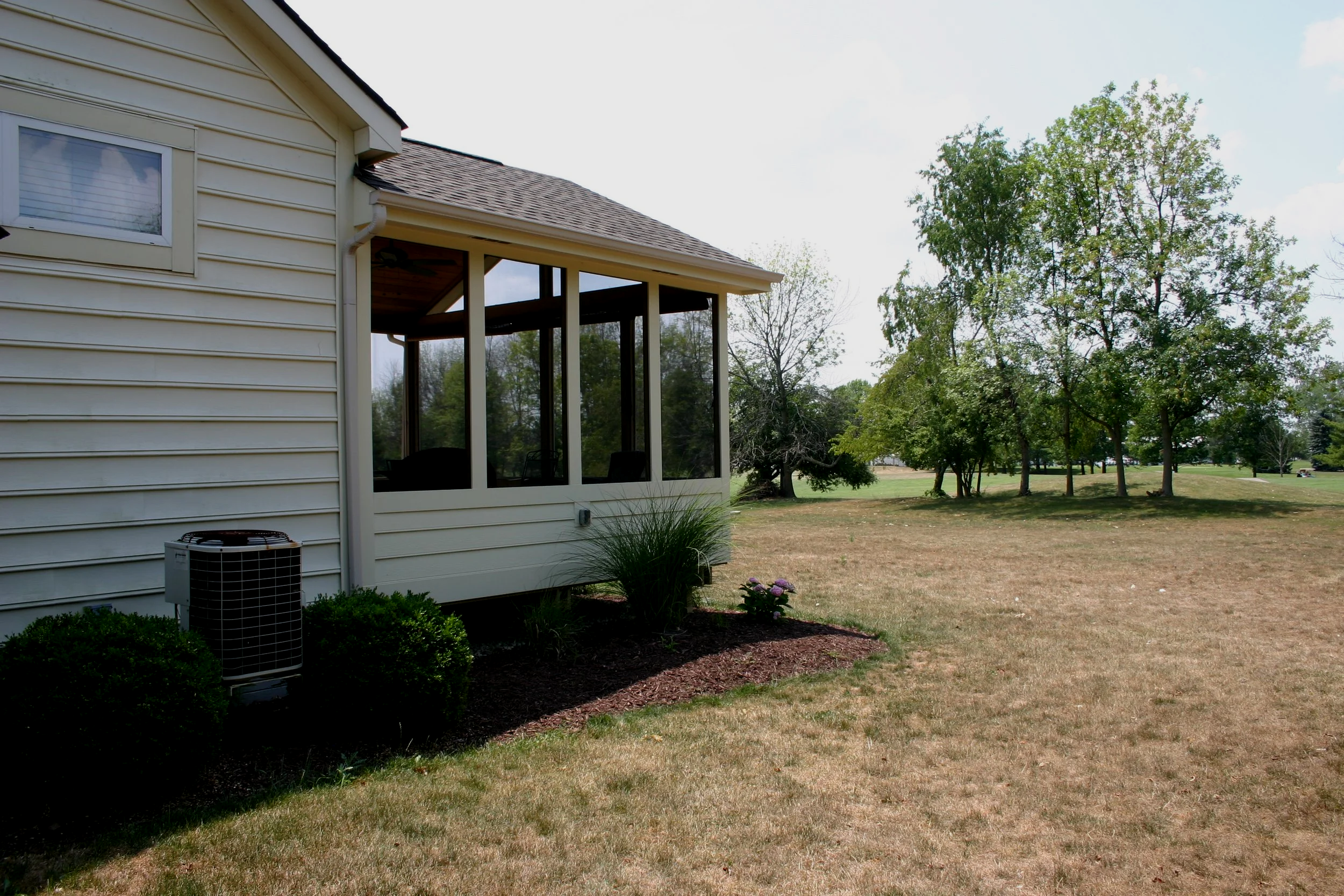 Deck Masters' custom wooden deck after a fresh rain. It’s Time to Bring Your Outdoor Living Space to Life with Deck Masters!