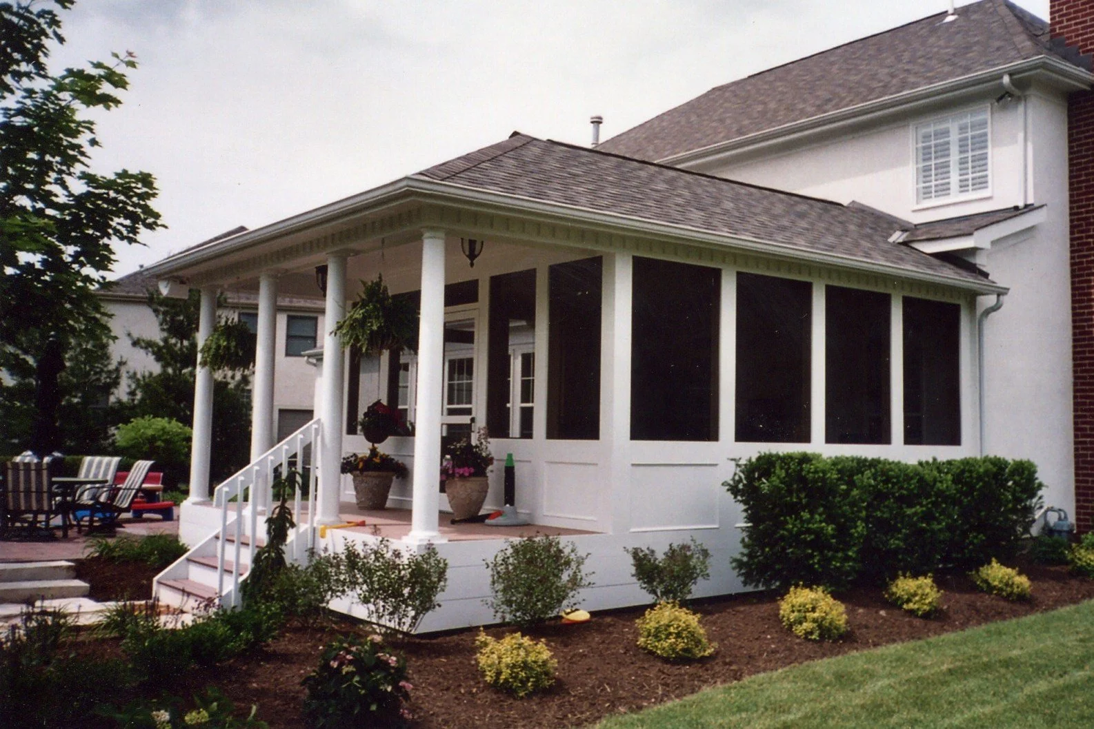 Deck Masters' custom wooden deck after a fresh rain. It’s Time to Bring Your Outdoor Living Space to Life with Deck Masters!