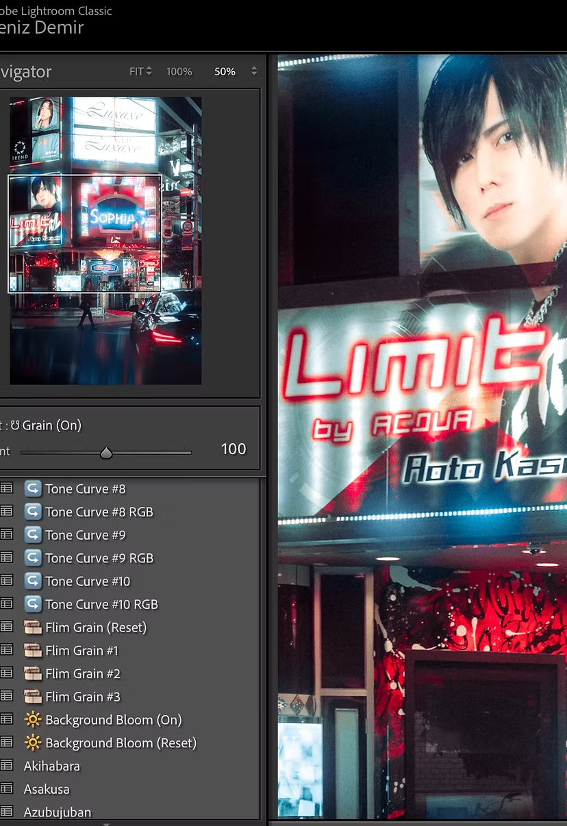 Nighttime city street with digital billboards, including a large display with a portrait of a young man and a sign reading 'LIMITE by AQUA' with 'Aoto Kastro'.