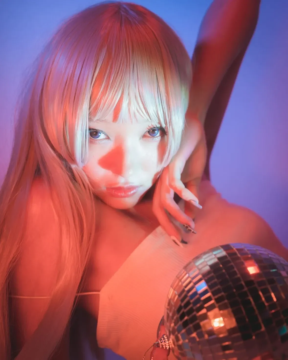 Lost in the glow of neon lights and shimmering reflections