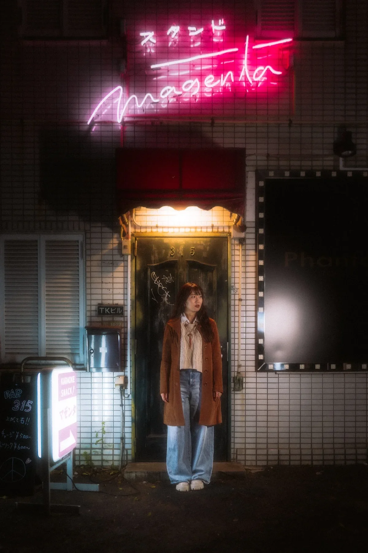  Off-the-beaten-path street portrait showcasing local authentic Tokyo lifestyle backdrops with little to no crowds. 