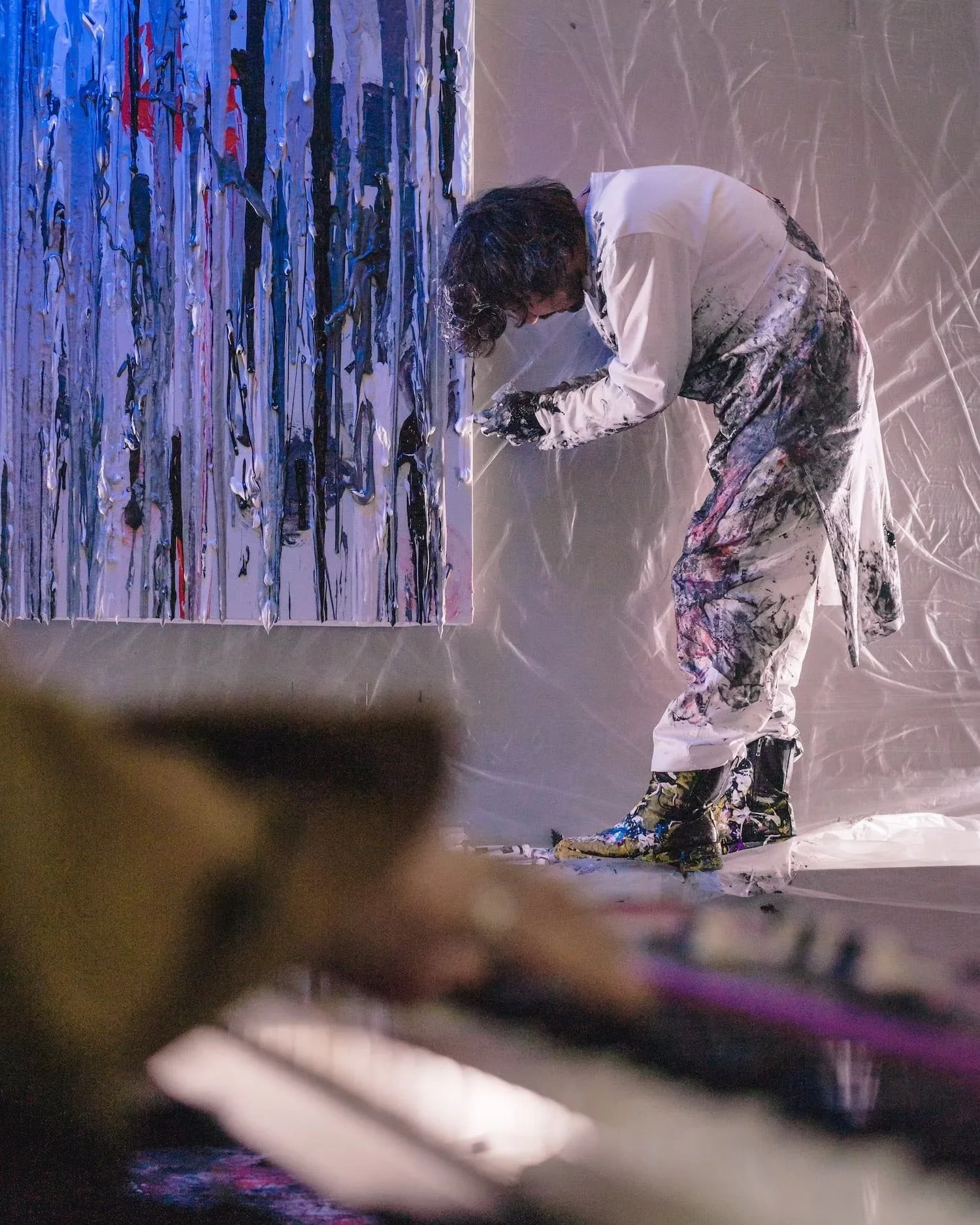Artist Creating Abstract Artwork into Live Performance