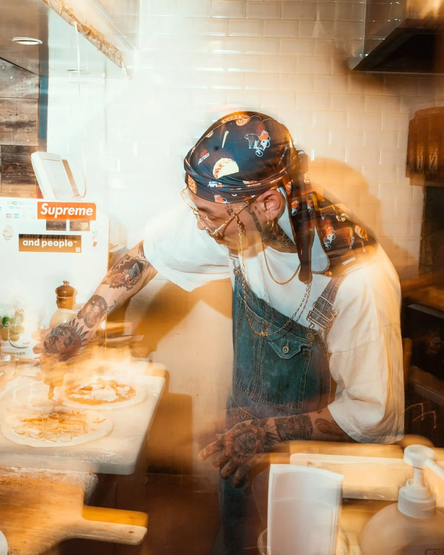 Pizza chef preparing and people- food at an event in Shibuya.